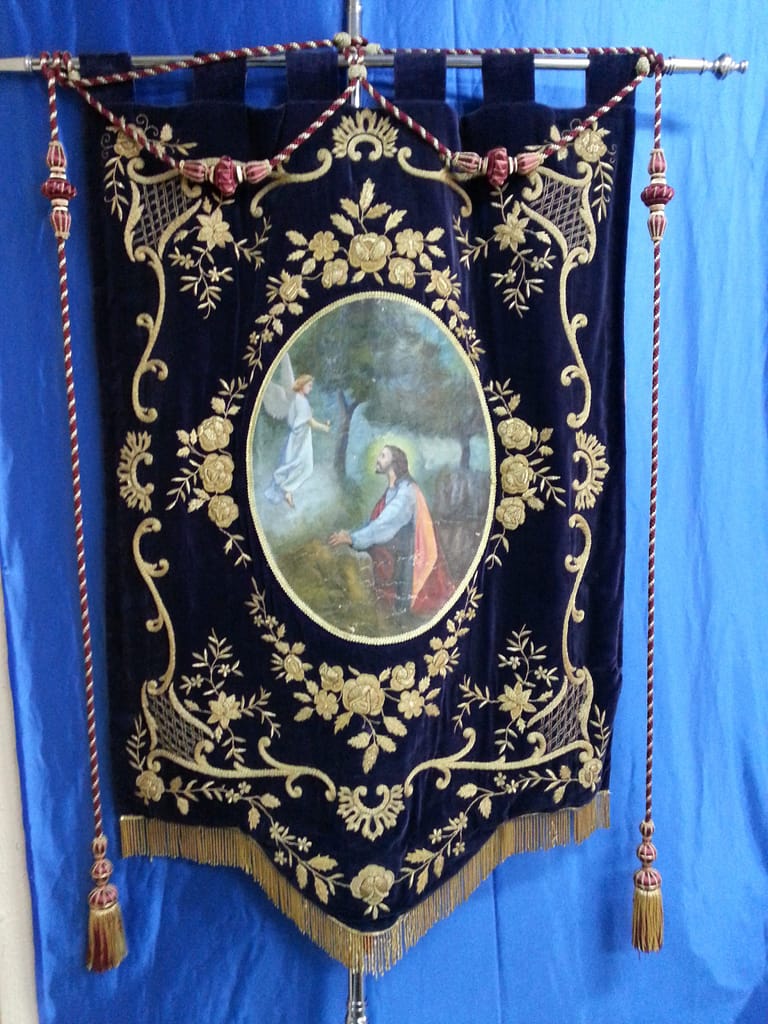 Estandarte de Jesús orando con el ángel